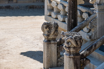 stone decoration at the building entrance in the Buddhist temple
