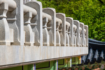 stone balcony fence at the Buddhist temple