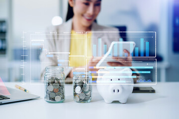 Asian businesswoman using tablet with financial analytics overlay. Concept of fintech, investment, data visualization, smart finance, and digital economy.