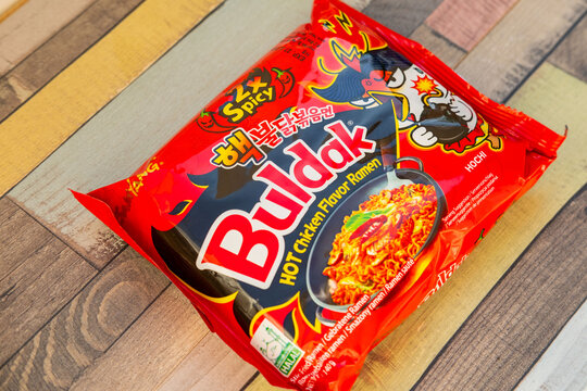 Korean instant ramen, Popular spicy noodle brand Buldak in spicy, cheese and carbonara flavors, global trend popular food product, snack sensation selection, fiery and creamy varieties