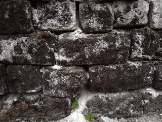 Background of very old stone wall texture photo