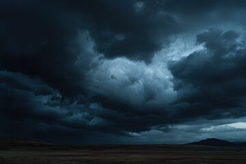 Obraz premium Dramatic storm clouds over a vast plain