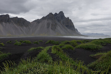 Sand dune and Vestrahorn mountain view in Iceland.