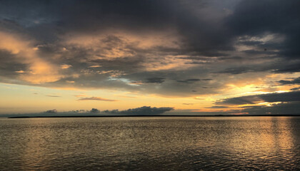 Fototapeta premium Golden twilight caresses tranquil waters, whispering secrets of Diwali's luminous promise and the introspection of Yom Kippur