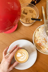 Cappuccino whispers under scarlet shade, almond-soaked Nordic fika moments, caffeinated daydreams, and ephemeral coffee pause on Cafe au Lait Day