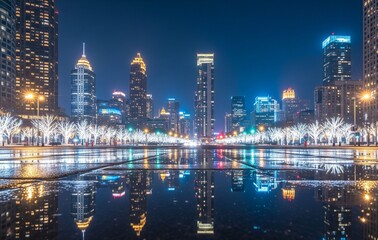 Fototapeta premium Winter city skyline at night with sparkling holiday lights