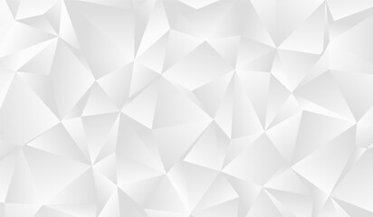 Obraz premium A vibrant composition of overlapping triangles and polygons in varying shades showcasing a captivating interplay of light and shadow.