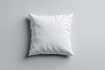 Obraz premium Blank white pillow on a gray surface (3)