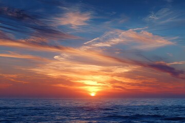 Obraz premium Dramatic sunset over a vast ocean