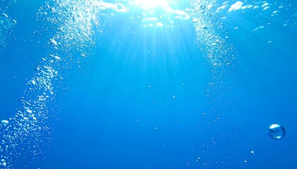 Underwater bubbles rising towards sunlight