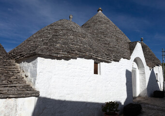 Italy, Apulia, Alberobello, view of the city on a cloudy spring day