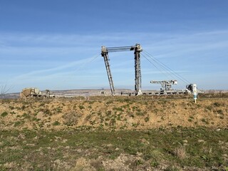 RWE lignite excavator in the Hambach open-pit mine behind a low earthen wall near the village of Bürgewald (formerly Morschenich), Germany, Europe, on February 25, 2025