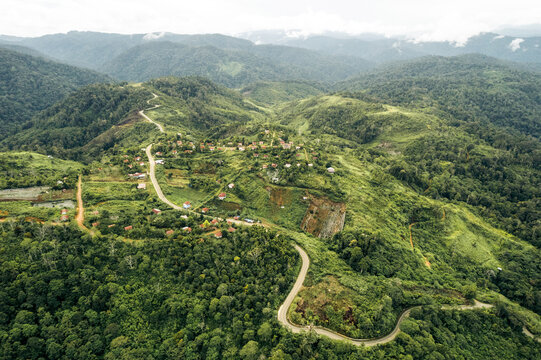 Aerial view of the twisty roads in the jungle of the Nagan Raya Regency, in Aceh, Sumatra, Indonesia