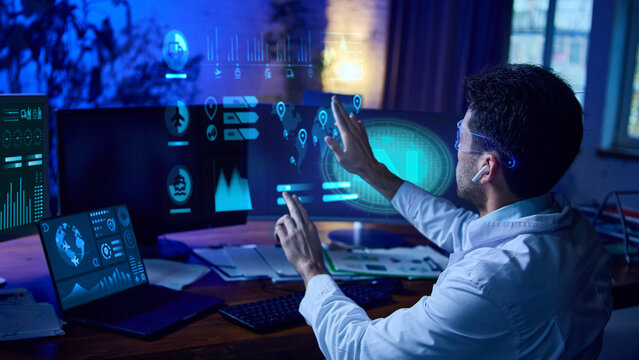 Man in smart glasses interacts with futuristic data dashboards and AI analytics interface. Concept of AI-powered workflows, data science, cybersecurity, and digital innovation. Collage