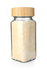 Garlic powder in glass jar isolated on white. Aromatic spice