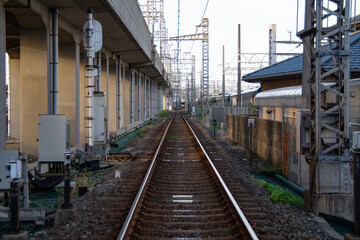 Fototapeta premium 京阪電車の萱島付近の踏み切りから見たレール