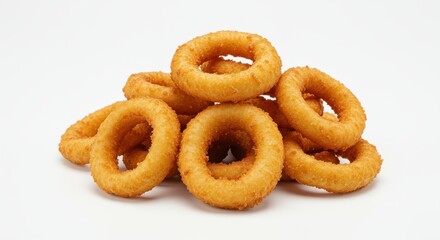 Fototapeta premium A pile of golden-brown, crispy onion rings, perfectly stacked against a white backdrop.