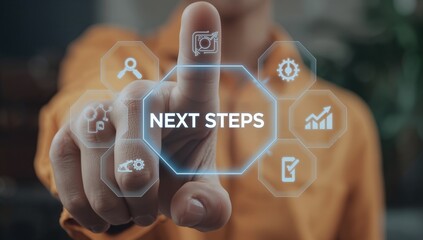 Man working on virtual touch screen presses inscription: NEXT STEPS. Next steps business concept. Next step of work, plan, strategies, vision, project implementation, new opportunities and execution