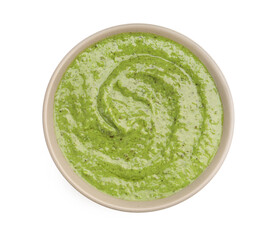 Fresh pesto sauce in bowl isolated on white, top view