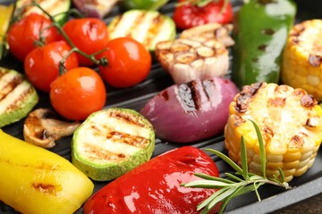Pan with grilled vegetables and spices, closeup
