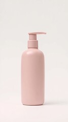 A minimalist pink pump bottle against a clean white background, showcasing a sleek and modern design.