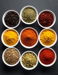 Colorful spices in small bowls