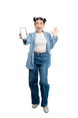 Full body Asian Woman holding smartphone happily in the studio with copy space. The woman looks excited and is wearing smart casual clothes on PNG
