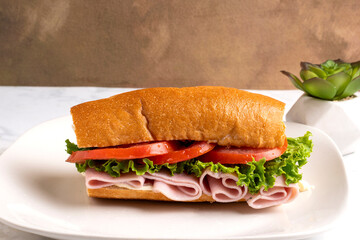 ham sub  with lettuce and tomatoes