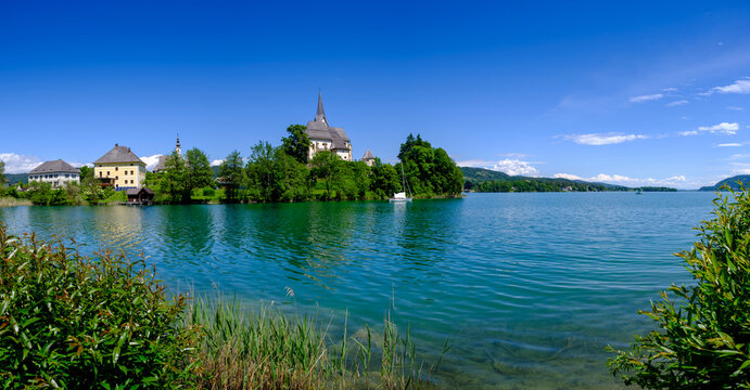 Church Maria W�rth on W�rther See lake in Carinthia Austria with tranquil scenery
