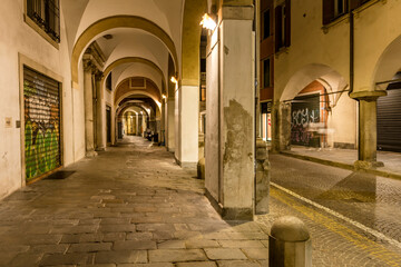 night light on street and covered walkways, Padova, Italy