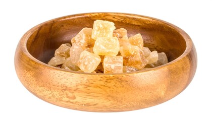 Candied cubes in wooden bowl