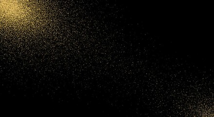 Sparkling golden dust particles shimmer and drift across a deep black background creating a magical, celebratory atmosphere