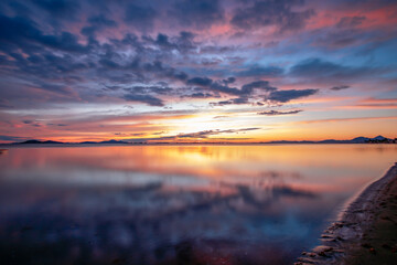 Colorful sunrise on the Mar Menor in the town of Los Urrutias, Cartagena, Mar Menor, Region of Murcia, Spain