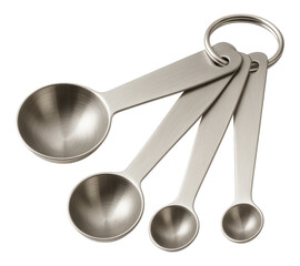 Set of four brushed metal measuring spoons, tablespoon and teaspoon kitchen utensil set held on a ring, Isolated on Transparent and White Background