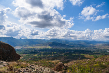 Amazing landmark with settlements and mountains and cloudy sky at Armenia-Georgia state border