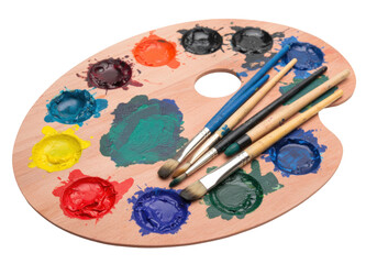 Obraz premium Isolated artist's paint palette with colorful paint and art brushes, used, close-up