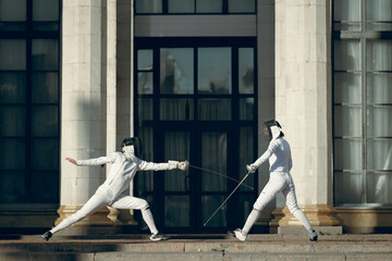 Fencing in the castle. Fencer womens.