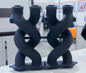 Object printed on 3D printer from molten plastic powder. Model black color printed on 3D printer from melted polyamide powder. Multi Jet Fusion MJF. Modern additive progressive 3D printing technology