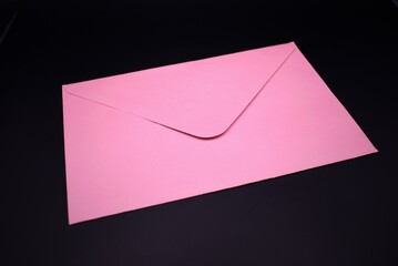 sealed envelope on a dark solid background