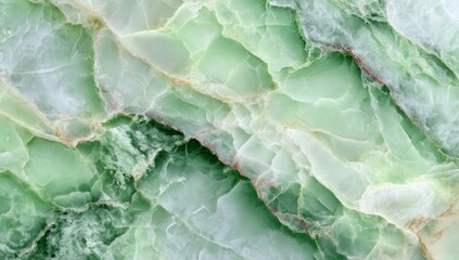 A natural abstract pattern for backgrounds is created by sage green marble texture accompanied by tan and white veins