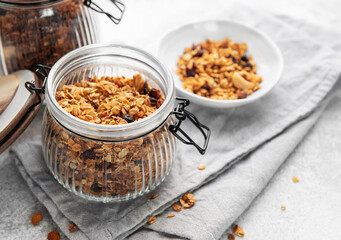 Granola cereal in glass jar ready for healthy breakfast