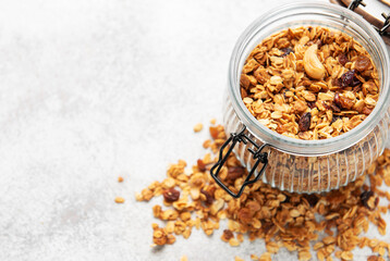 Granola cereal in glass jar for healthy breakfast