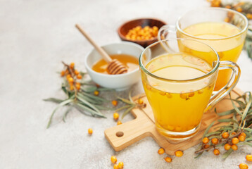 Sea buckthorn berry tea preparing a healthy drink