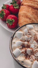 Hot coffee with cookies and strawberry