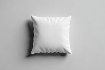 Blank white pillow on light gray background