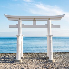 White torii gate on beach