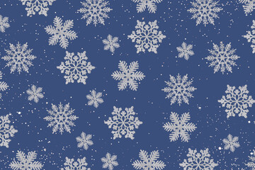 Christmas blue background of silver snowflakes flying in the air with copy space. Holiday card for New Year and Christmas