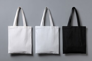 Three blank tote bags in various colors