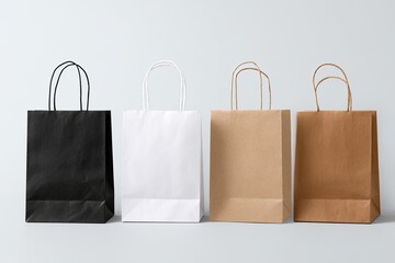 Four paper shopping bags in different colors