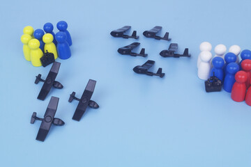 People figures with remote control and many military drones on blue bacground.